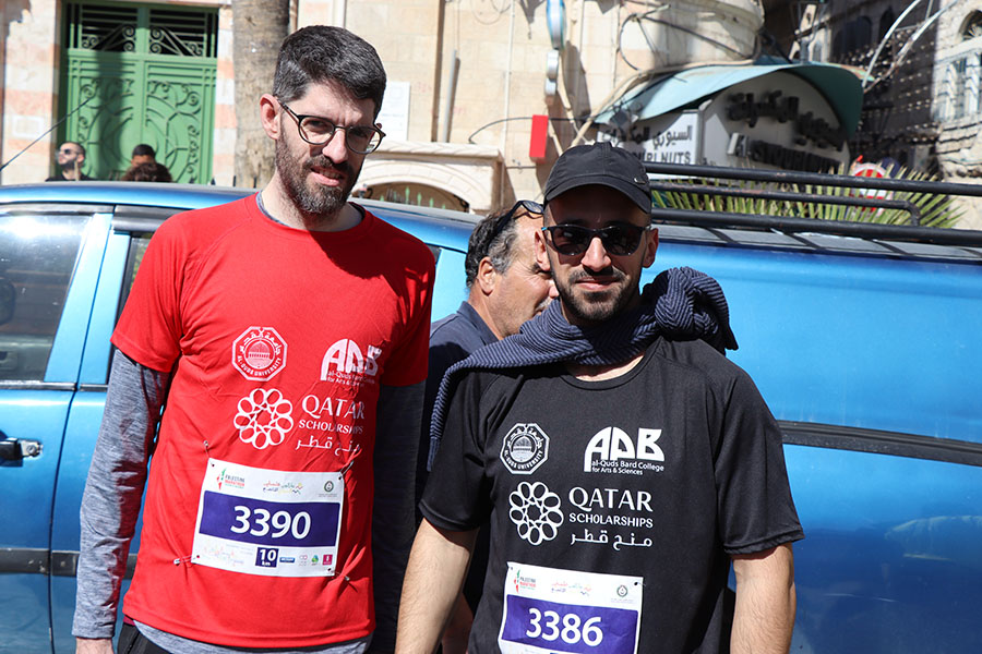 2 male students participating the Palestine Marathon.