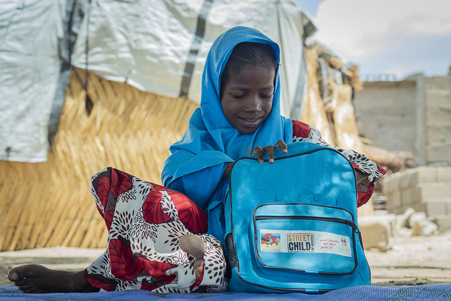 Student with her backpack.