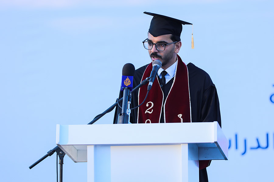 Dr. Mohammed Saqer speaking at his graduation.