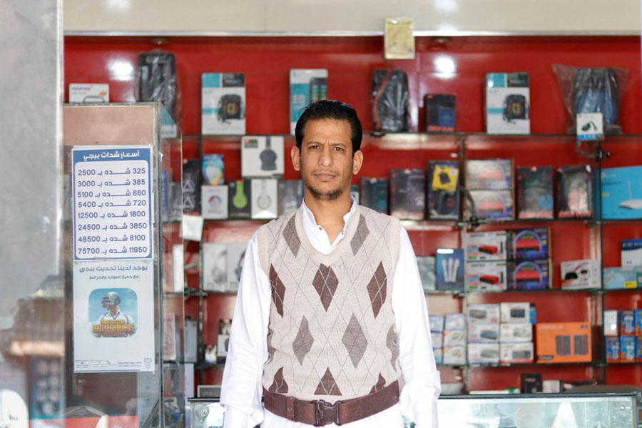 Saddam runs a business that not only earns income, but also preserves resources and supports digital inclusion.