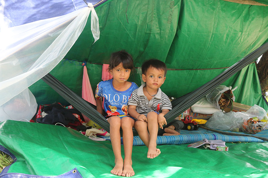 Child under hammock in Cambodia