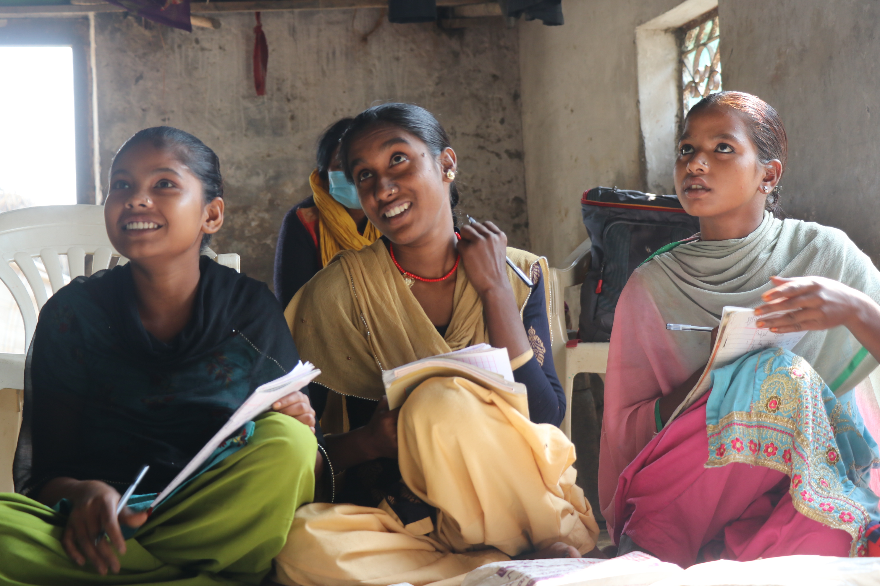 3 female students in a class in India